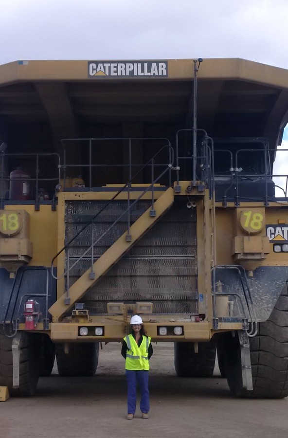 Mining dump truck towers over SOOP team member